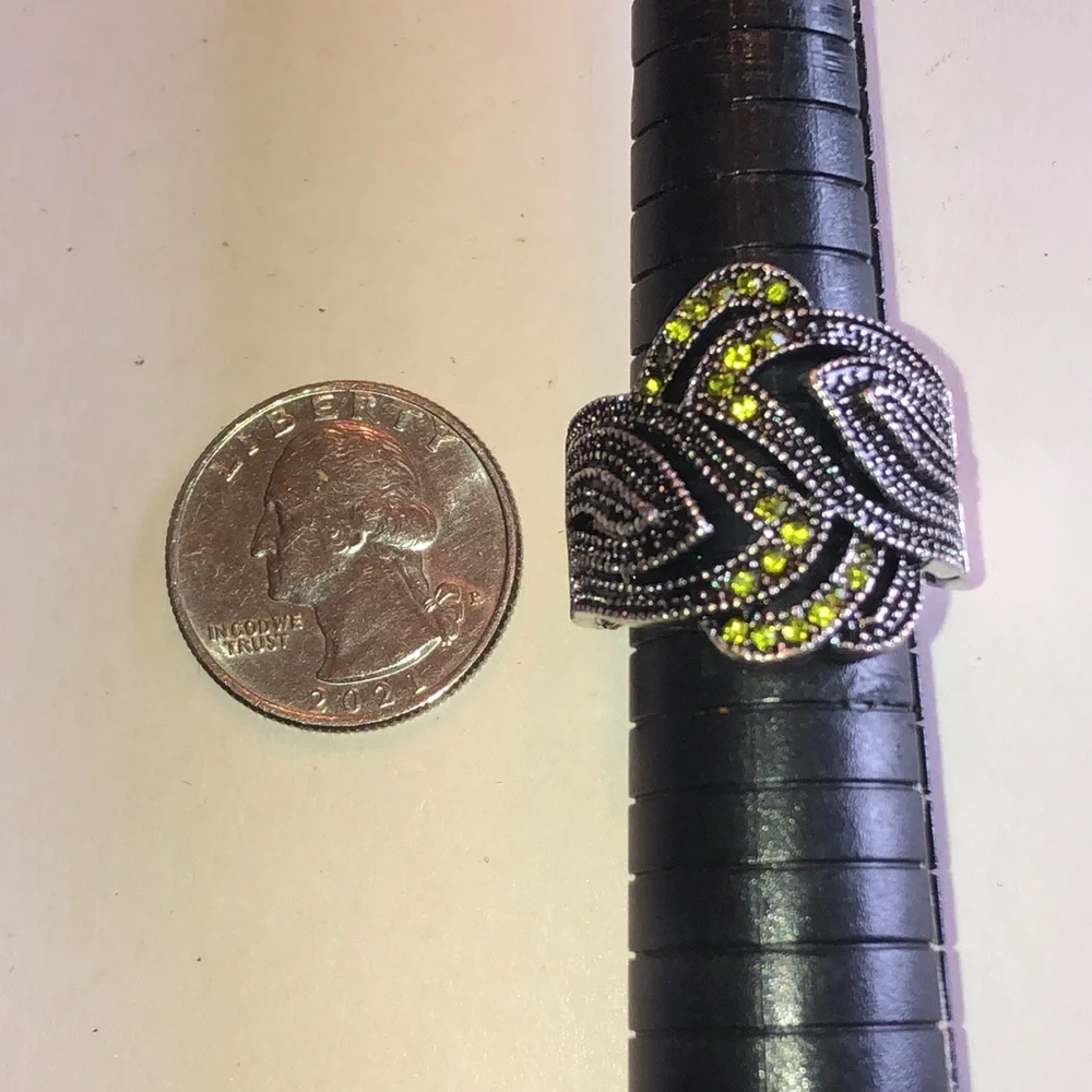 Silver Tone Ring with Green Crystal Accents